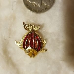 Hody vintage tropical fish pendant.